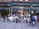 People eating outside of Sweet Tomatoes.  Click to enlarge.