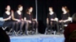 Women tap-dancing while sitting.    Click to enlarge.