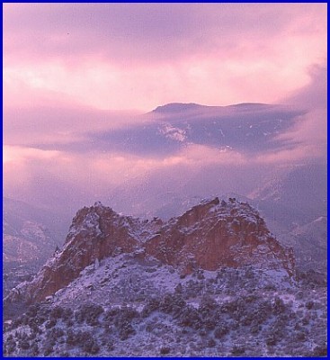 If you are tired of seeing this rock look at the clouds and Rampart Range background