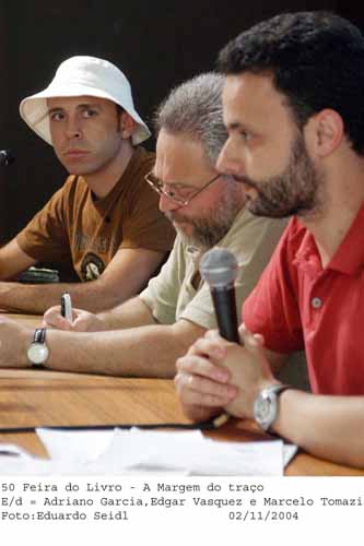 Seminrio  Margem da Palavra - na mesa, da esquerda para a direita, o ilustrador Adriano Garcia, o cartunista Edgar Vasques e Marcelo Tomazi. Fotografia:  Eduardo Deidl.