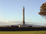 Savage memorial with Rangitoto behind