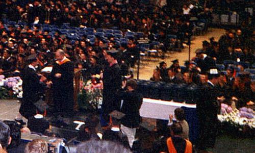 Joel receiving his diploma