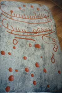 rock carving with ships