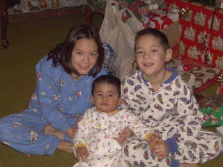 Aleisha, Nikhil and Riley on December 25,2002