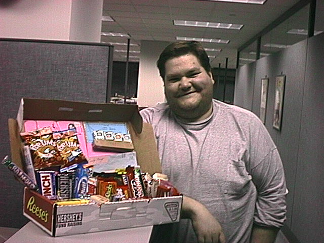 Fat Dave stealing candy from the charity box