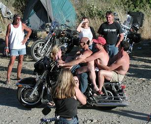 Unsafe riding practice, but good road sign cooperation