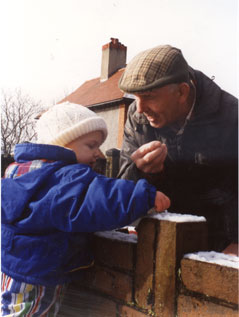 Shawn and tadkee Gwinn look at the snow in nineteen ninety four