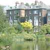 pond or lake and houses