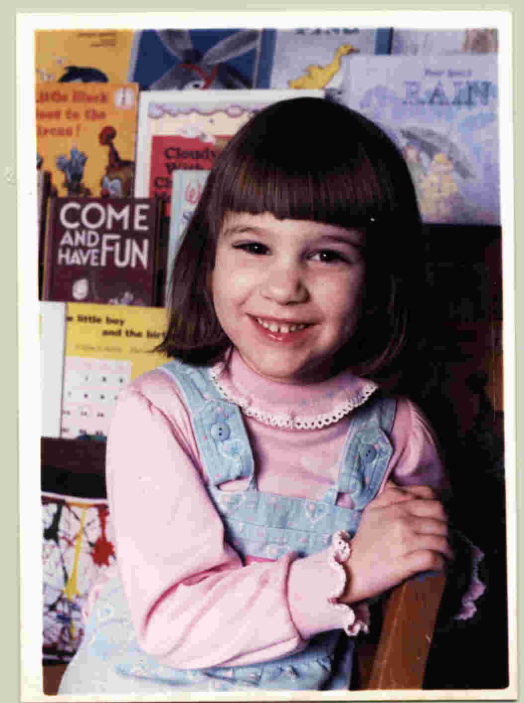 The only school photo I like. I'm three, in Pre-K.Damn, I had short hair with bangs! It was even strait then! Scary...