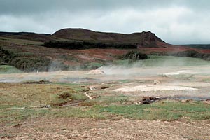 Steam Emerging from Geysir's Pool of Boiling Water