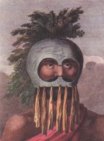 A bearded Hawaiian wearing a ceremonial gourd mask.