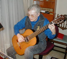 Margy plays her guitar for the first time