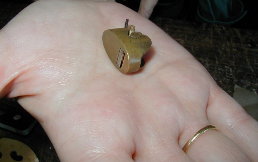 a tiny brass plane