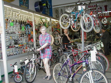 Wheeling our bikes out of the store