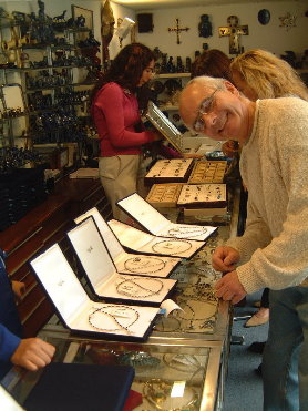 Ray selecting jewelry for Shelley