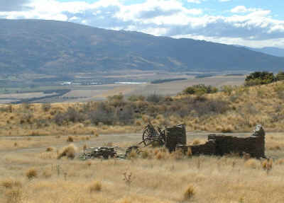 Valley view with cart and miners cottage ruins (13394 bytes)