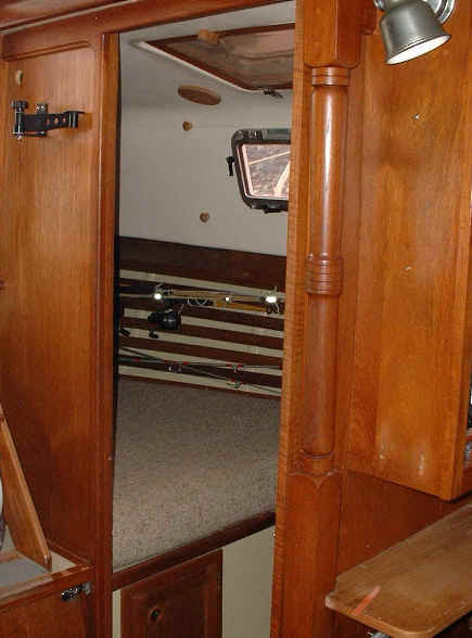 Aft stateroom showing louvered door open.