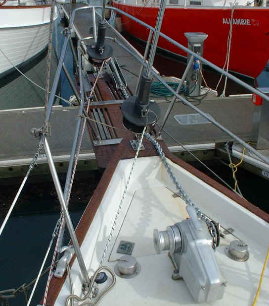 Anchor locker is split into two compartments. Windlass can be used for either anchor.