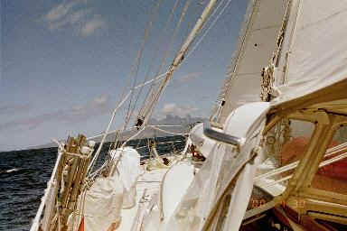 Tethys close hauled in the Marquesas with Ua Pou visible in the distance.