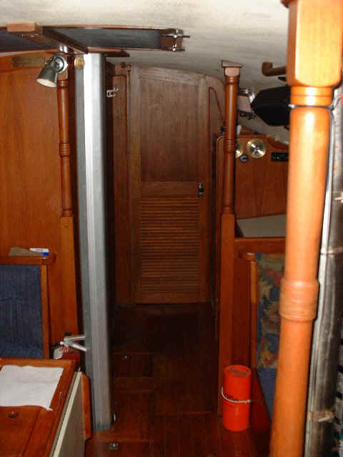 Looking forward towards. Forward stateroom door is closed.