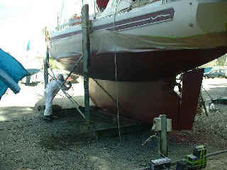 Tethys gets two coats of antifouling sprayed on.