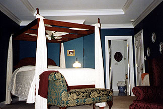 The four-poster bed in the Beautiful Dreamer Room