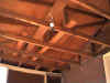 before the ceiling rafters are removed