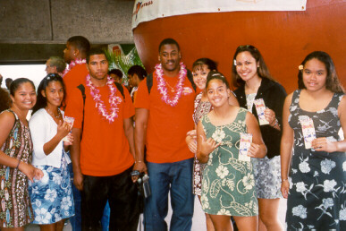 Hula Bowl players Mike Woods (left) and Tarrell Knauls pictured with AOHT members