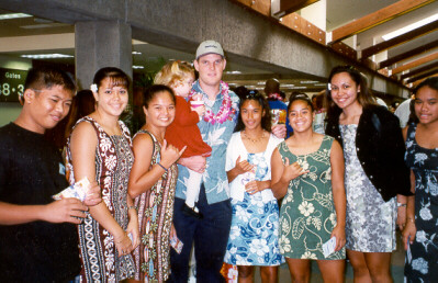 University of Hawai`i quarterback, Dan Robinson, pictured with AOHT members