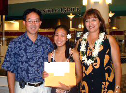 $1,000 scholarship recipient, Shanthel Savella, pictured with presenters, Brian Kawabe of American Express and Lani Correa of the Maui Hotel Association