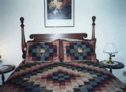 Sleep well in the antique poster bed.