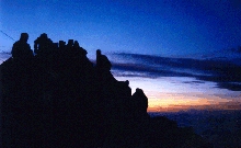 Silhouette of summit against the sunrise