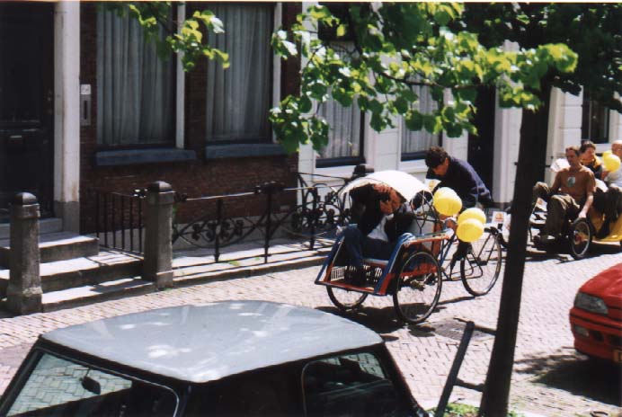 Sorry it's so big. Rob pedalling a trishaw, slowly