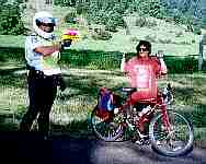 Policeman squirting water pistol at Joyce