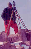 Frank at the theodolite on Cornerstone Peak.