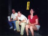 Matt, Farris and Jen sitting on the water