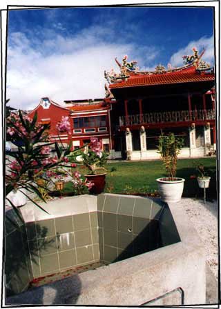 Cheah Kongsi with a well in foreground