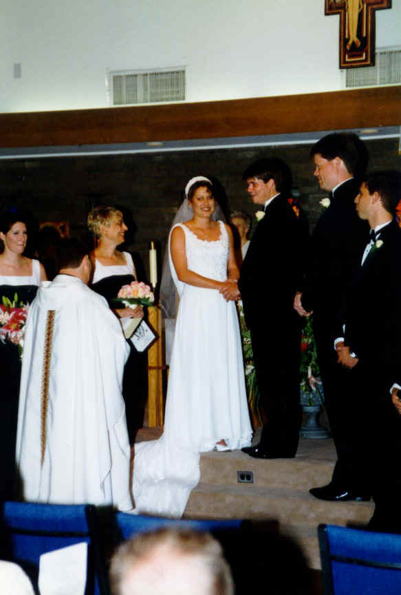 Mike and Mel exchanging vows