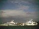 Group of megayachts at Harbour Island