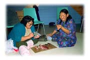 Village Elders Feasting on Raw Caribou and Arctic Char, Cape Dorset, Baffin Island, Northwest Territories