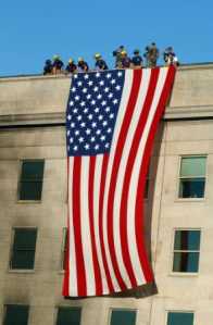 Fire and Rescue workers display the U.S.A. flag at The Pentagon (9k)