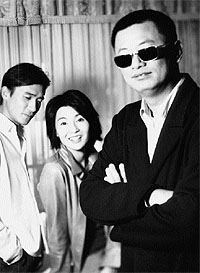 Wong Kar-wai with Love co-stars Tony Leung and Maggie Cheung