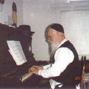 at the piano