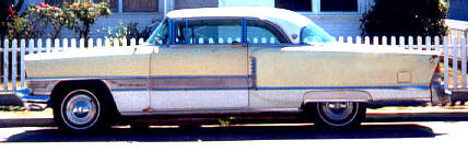 A Yellow and White 1955 Packard