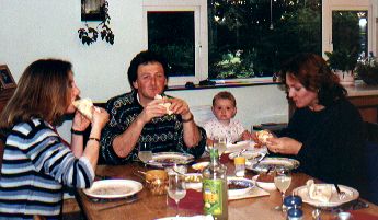 Carla, Norman and Shauna braving my first attempt at cooking fajitas - Tia watches apprehensively...