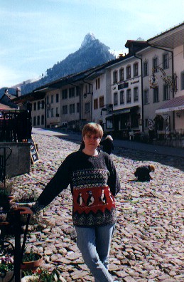 Standing in the cobbled street of Gruyeres, Switzerland