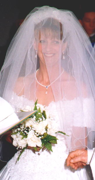  Sly smile at Greg during the ceremony