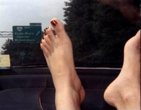 Hongee's purty toes on the dash of my old POS car during her visit July '99