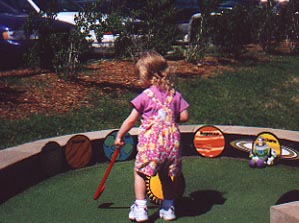 Playing mini golf