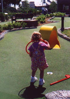 Playing mini golf